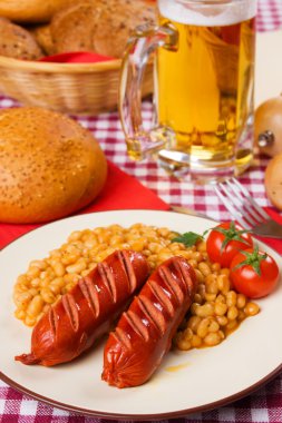 Grilled sausage with white beans clipart