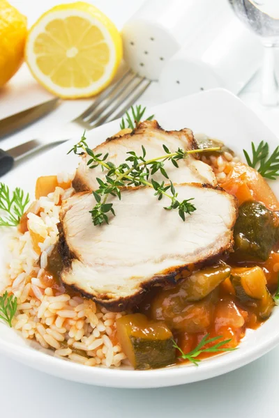Roasted pork meat with rice and vegetables — Stock Photo, Image