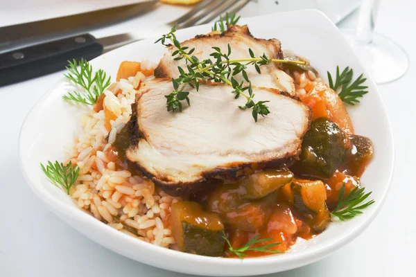 Roasted pork meat with rice nad vegetables — Stock Photo, Image