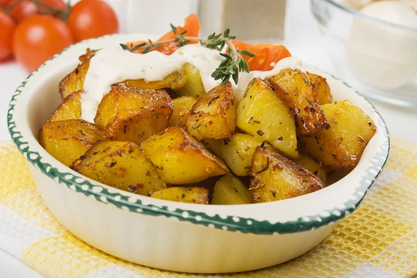 Roasted potato with herbs and cream — Stock Photo, Image