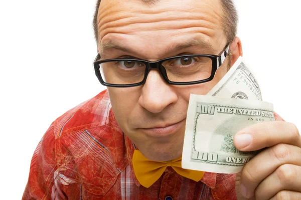 Hombre adulto sosteniendo billete de cien dólares — Foto de Stock