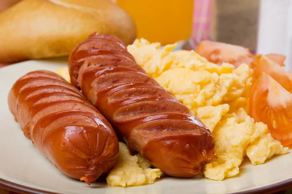 Fried sausage with scrambled eggs — Stock Photo, Image