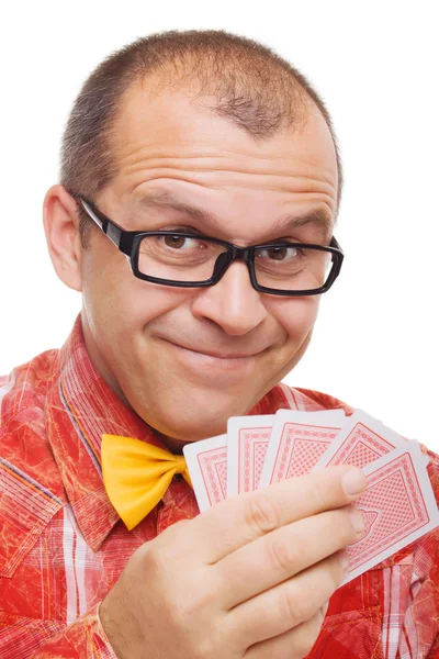 Joueur souriant tenant des cartes à jouer — Photo