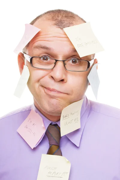 Empresário coberto com notas pegajosas — Fotografia de Stock