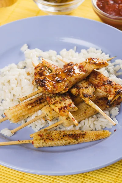 Asian skewed chicken with rice and baby corn — Stock Photo, Image