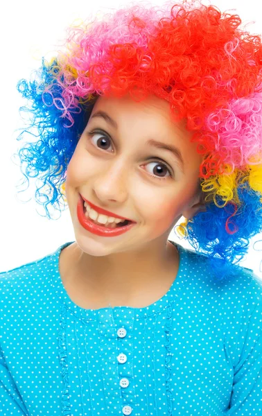 Menina jovem com peruca de festa colorida — Fotografia de Stock