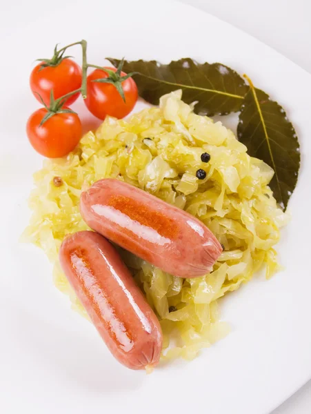 Sauerkraut with sausages, traditional german meal — Stock Photo, Image