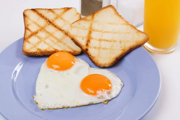 Fried eggs served for breakfast — Stock Photo, Image