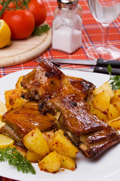 Grilled ribs with baked potato Stock Picture