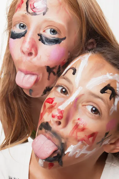 Fiatal lányok, festett arccal — Stock Fotó