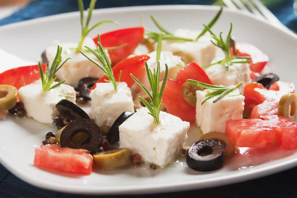 Cheese, tomato and olive salad — Stock Photo, Image