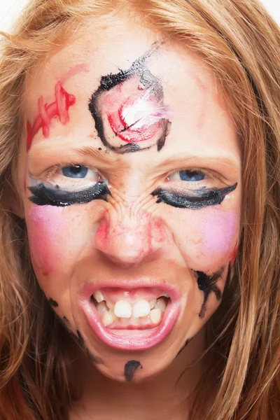 Mädchen mit gemaltem Gesicht — Stockfoto