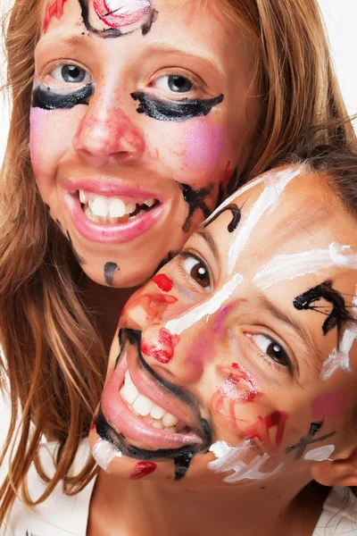 Twee beschilderde gezichten — Stockfoto