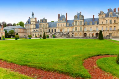 France. Park and a palace of Fontainebleau clipart