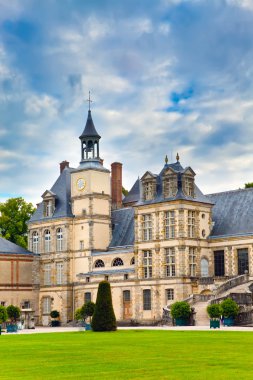 France. Park and a palace of Fontainebleau clipart