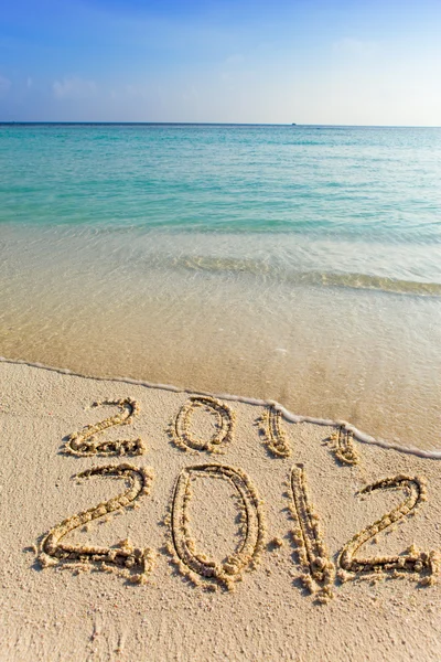 Yeni 2012. dalga bir yazıt 2011 off yıkar. — Stok fotoğraf