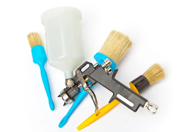 Spray gun and brushes - a set for repair work — Stock Photo, Image
