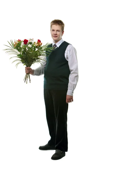 L'élève en uniforme scolaire avec un bouquet de fleurs — Photo