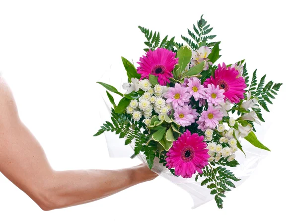 Brawny man's hand with a bouquet of flowers — Stock Photo, Image