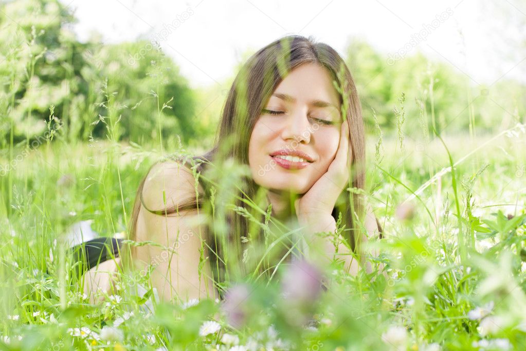 Beauty girl relaxing in nature