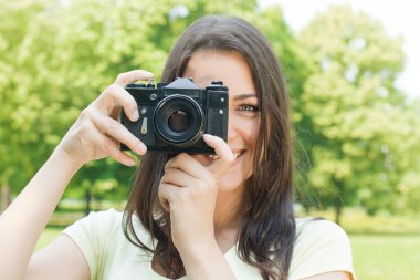 Woman taking photo clipart