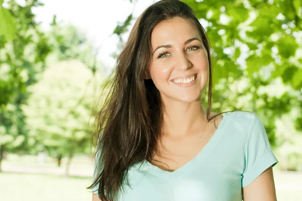Happiness young woman in park — Stock Photo, Image