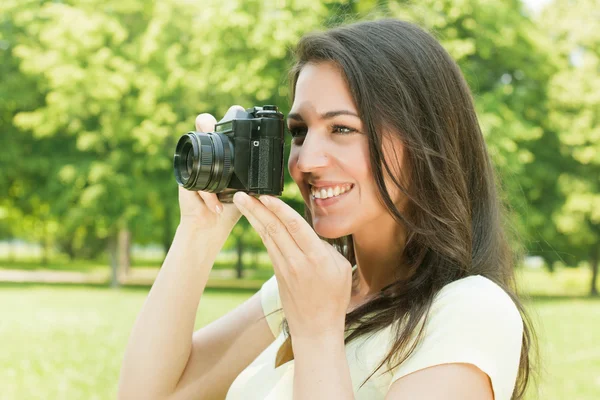 Girl photographer Stock Image