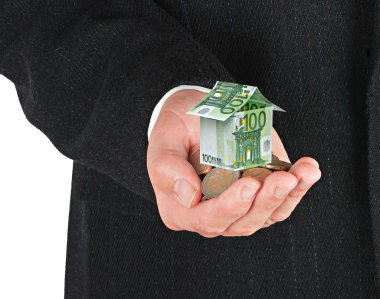 Money house in hands clipart