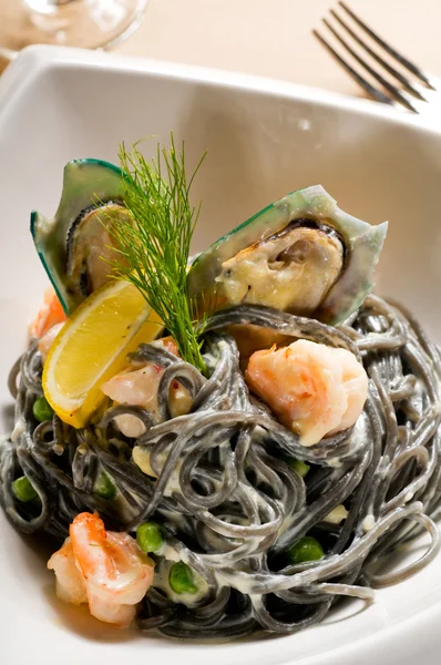 stock image Seafood black spaghetti