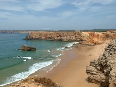 Monumental cliff coast near Cape St Vincent, Portugal clipart