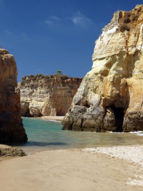 Colourful rocks on the Algarve coast clipart