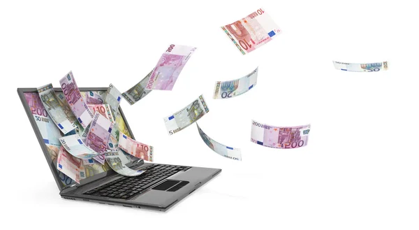 Laptop und Banknoten — Stockfoto
