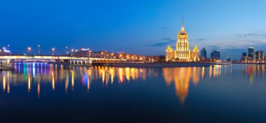 Night Moscow. Moscow River. Hotel Ukraine. clipart