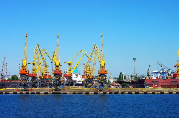 stock image View on seaport with cranes at day