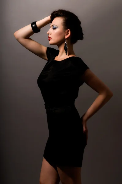 Beautiful woman in a dress — Stock Photo, Image