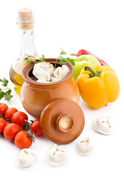 Meat dumplings in pot and ingredients — Stock Photo, Image