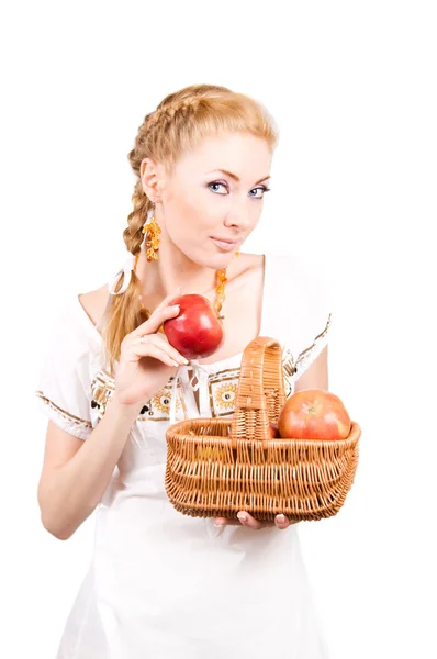 Woman with basket of apples — Stock Photo, Image