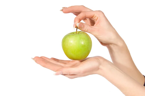 Woman hands holding green apple — Stock Photo, Image