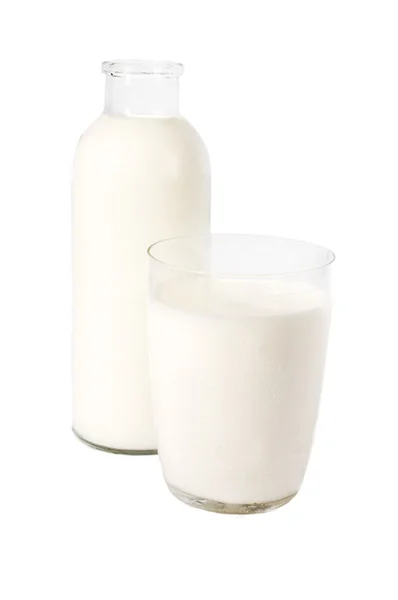 Palack és pohár tej — Stock Fotó