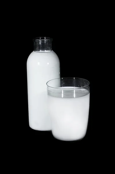 Flasche und Glas Milch — Stockfoto