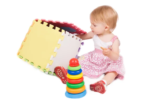 Baby girl playing Stock Image