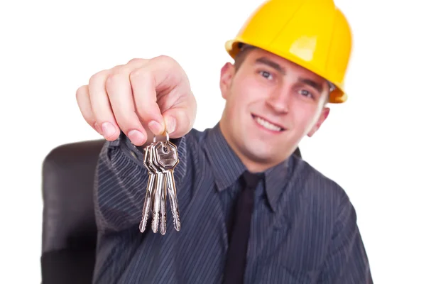 Young architect with keys Royalty Free Stock Photos