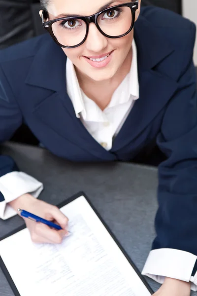 Businesswoman making note business — Stock Photo, Image