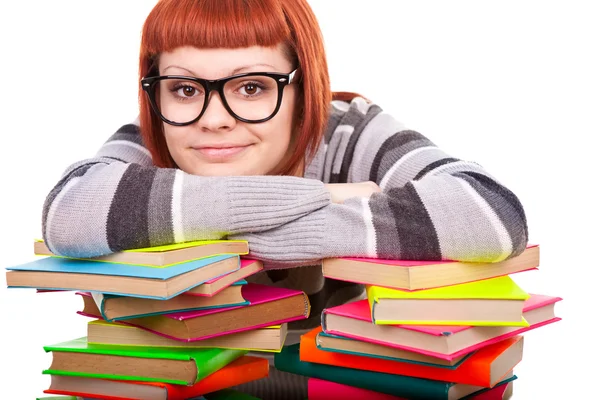 Teenage resting on stack of books — Stock Photo, Image