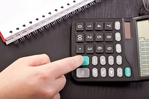 Finger on calculator — Stock Photo, Image