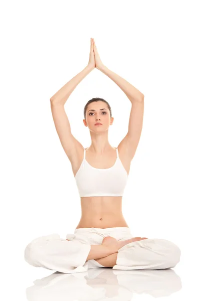 Yoga yapan bir kadın. — Stok fotoğraf