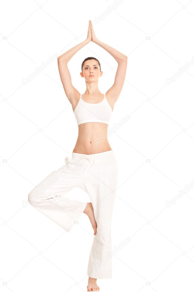 Woman in yoga tree-pose