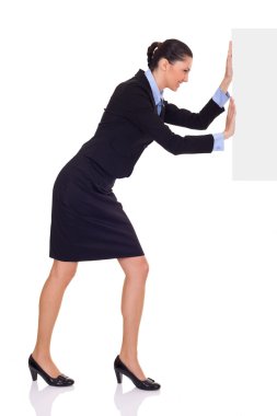 Businesswoman pushing blank paper clipart