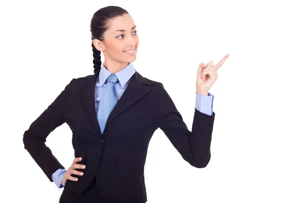 Businesswoman pointing in advertising — Stock Photo, Image
