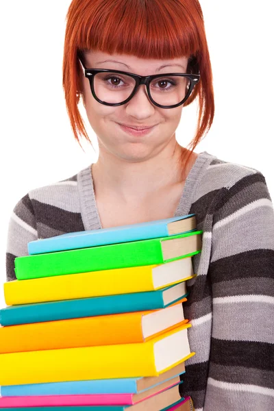 Divertida estudante com livros de pilha — Fotografia de Stock